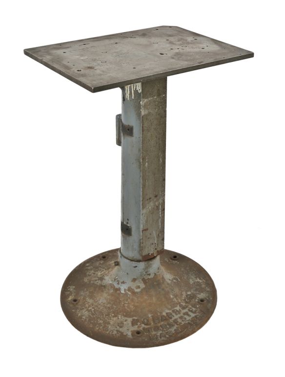 one of two nearly identical c. 1940's american industrial freestanding tapered cast iron pedestal salvaged chicago machine shop grinder base with detachable steel deck