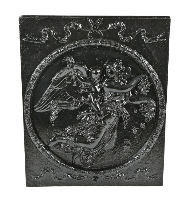 original early 1890's antique american victorian era black enameled ornamental cast iron fireplace summer cover with deeply embossed figural rondel