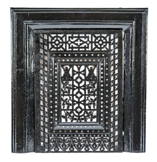 original and intact black enameled two-piece salvaged chicago interior residential fireplace detachable summer cover with matching suround 