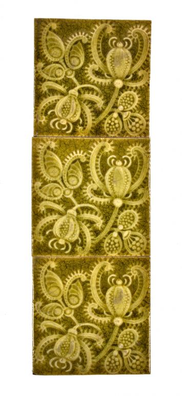 group of three original 19th century matching green majolica glazed residential fireplace tiles with allover dazzling floral motifs 