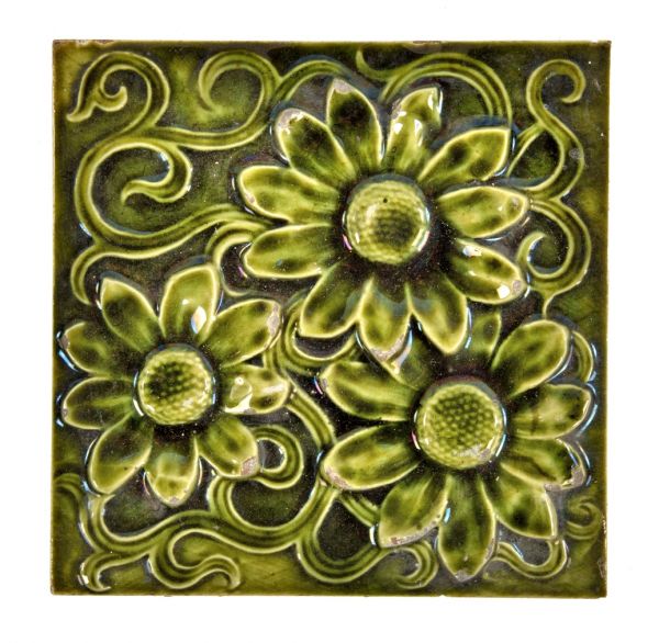 richly colored original c. 1880's american victorian era salvaged chicago residential fireplace green glazed tile featuring multiple sunflowers 