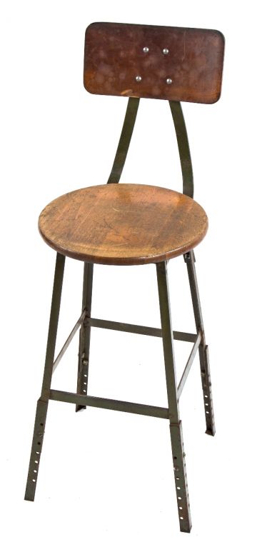 original 1940's pollard brothers four-legged riveted and welded steel adjustable height factory stool with original olive green enameled finish and maple wood seat