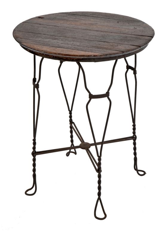 original late 19th or early 20th century antique american ornamental twisted steel four-legged table with intact oak wood tabletop 