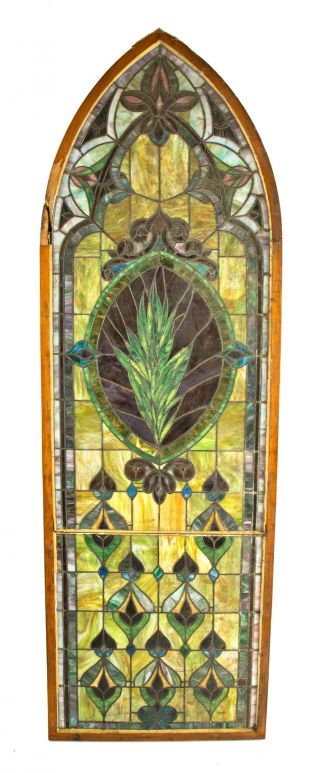 massive late 19th or early 20th century original richly colored chicago gothic style stained glass window featuring a centrally located plant form 