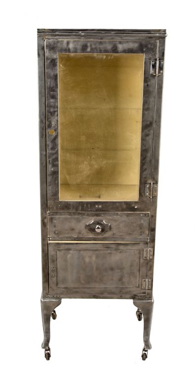 c. 1930's american depression era mobile cold-rolled steel salvaged chicago hospital operating room supply cabinet with glass shelves and drawer and cabinet door