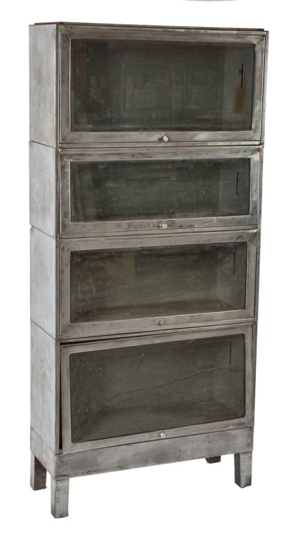 refinished vintage american industrial brushed metal "property of nasa" government sectional or stackable freestanding barrister bookcase with folding glass doors