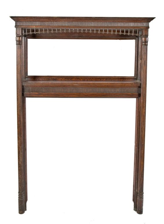 oversized all original 19th century varnished oak wood salvaged chicago antique american victorian era fireplace mantel with solid fluted posts and intact beveled edge mirror 