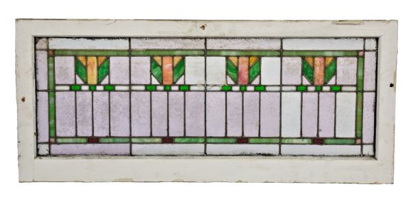 strongly geometric early 20th century antique american chicago prairie style leaded art glass window with a series of abstract floral motifs 