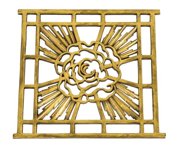 one of two visually striking early 1920's ornamental cast bronze interior residential art deco style single-sided perforated radiator grille with centrally located abstract flower