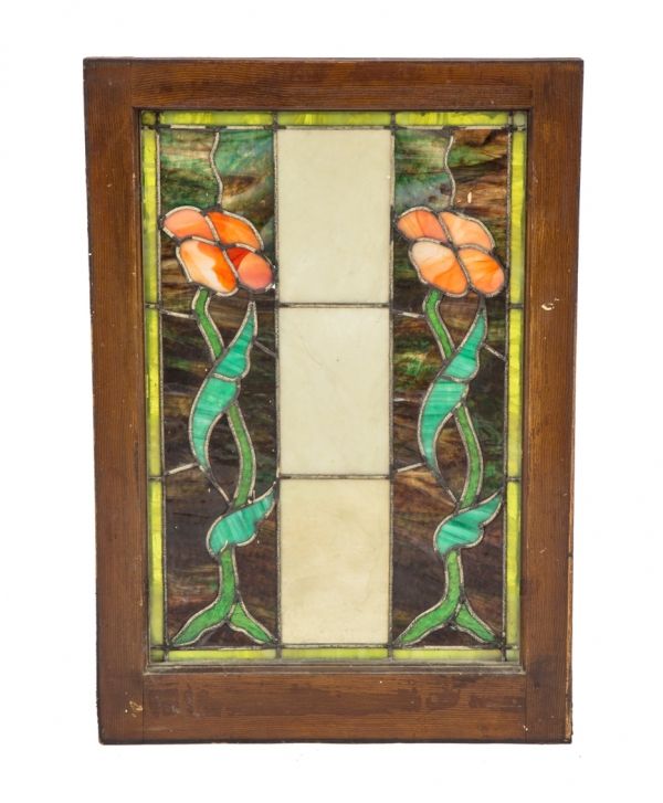 marvelous early 20th century finely executed american art nouveau leaded art glass interior residential window featuring two richly colored flowers withe leafage 