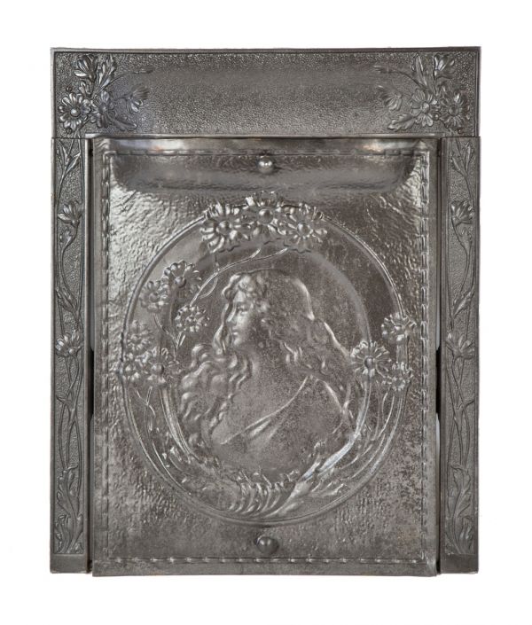 original late 19th or early 20th century cast iron and steel american victorian era interior residential fireplace mantel summer cover and matching surround  