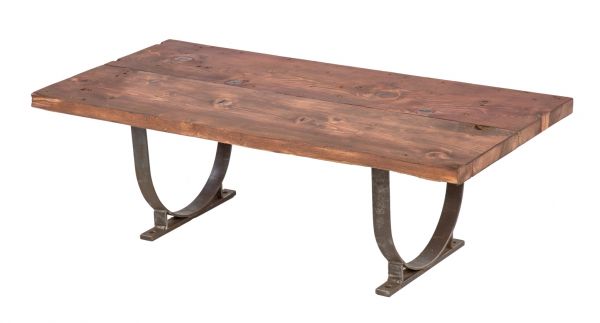 repurposed vintage american industrial low-lying stationary coffee table with brushed metal bases and newly added varnished pine wood tabletop 