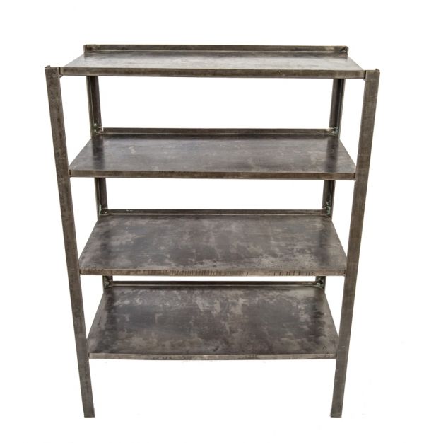 completely refinished vintage american industrial four-legged welded joint heavy gauge steel factory machine shop shelving unit with brushed metal finish 