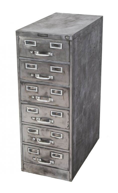 one of two matching original heavy duty cold-rolled steel six-drawer freestanding factory machine shop shelving units with brushed metal finish 