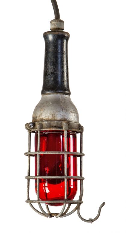 c. 1930's original and intact richly colored ruby red crouse-hinds "explosion proof" trouble light fixture or pendant with black enameled wood handle and cage or bulb guard 