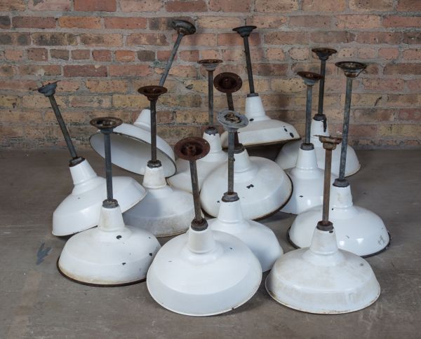 several matching c. 1930's original and intact salvaged chicago fulton market sausage factory white porcelain enameled pendant light fixtures with steel posts and ceiling canopies