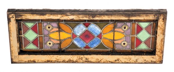 elegantly designed c. 1880's american antique victorian era salvaged chicago interior residential stained glass window accentuated with uniquely colored rondels  