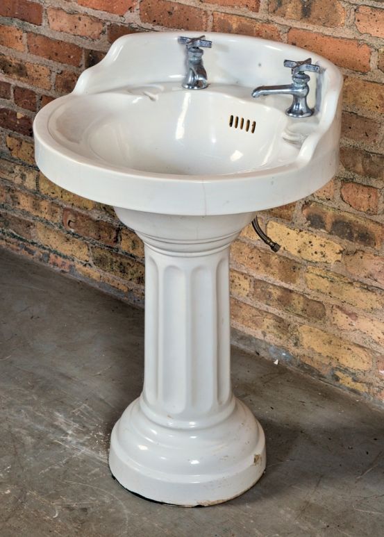 impressive all original and intact early 20th century white vitreous china two-part interior residential lavatory sink with deep and compact bowl and fluted pedestal base  