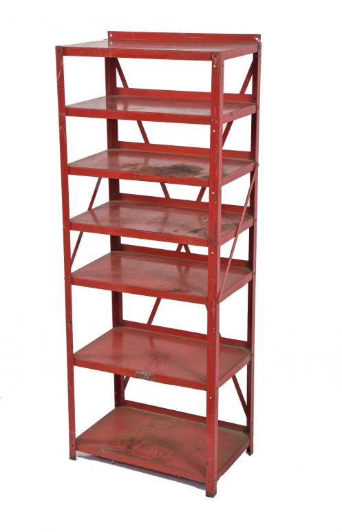 nicely aged original 1940's salvaged chicago red painted steel general store freestanding shelving unit with cross-bracing and angled steel supports 