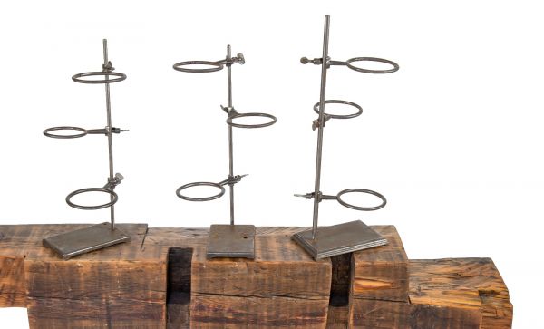 set of two nearly identical vintage industrial brushed metal laboratory stands with fully adjustable ring clamps 