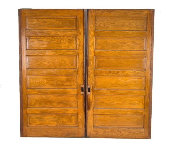 late matching set of 19th century oversized six-panel solid oak wood salvaged chicago pocket doors with original finish 