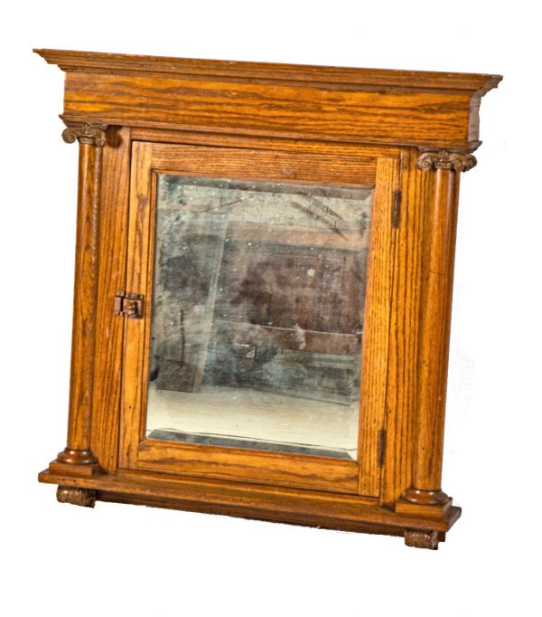 hard to find and highly sought after all original 19th century solid oak wood victorian-era bathroom medicine cabinet with original beveled mirror