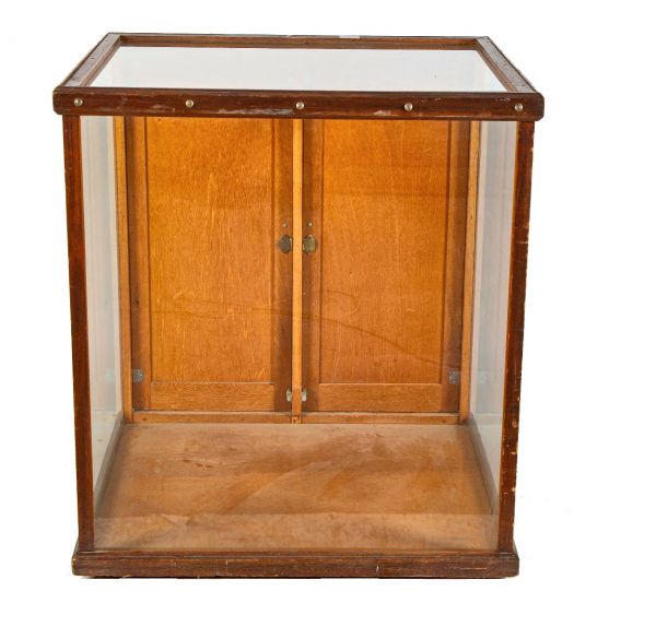 unusually sized all original early 20th century antique american varnished wood display case or cabinet with lockable doors