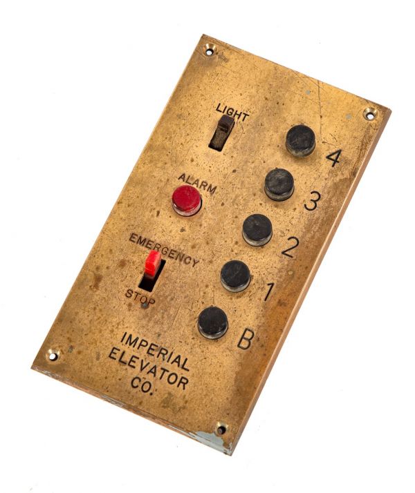 salvaged chicago loft building imperial freight elevator cab or car control panel with bronze faceplate and push-buttons