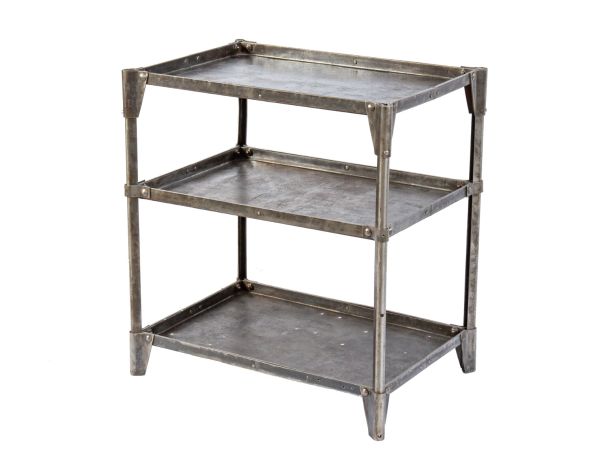 early 1930's antique american industrial freestanding pressed and formed steel stationary "uhl art steel" tool stand with riveted joint reinforced corner guards