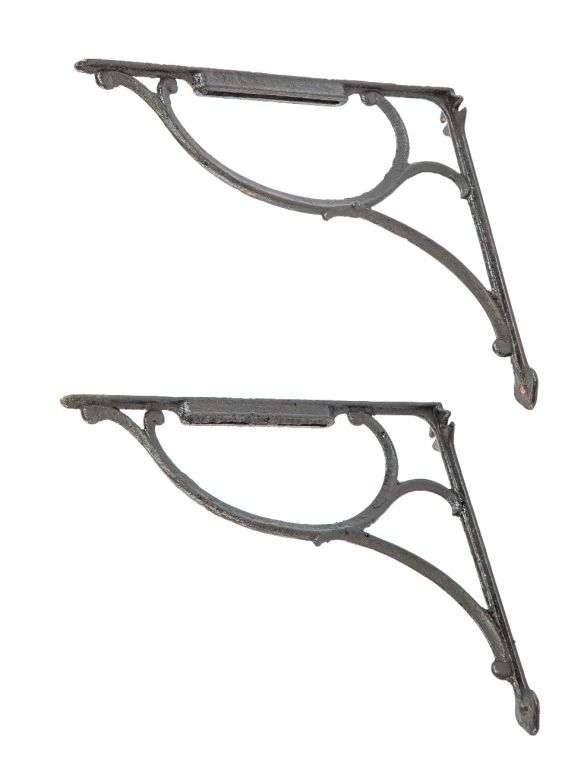 matching set of early 20th century antique ornamental cast iron salvaged chicago oversized garcy wall shelf or sink brackets with black enameled finish 