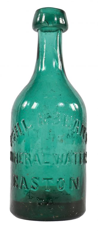 early to mid-1850's privy dug emerald green iron pontiled squat body soda bottle with high shoulders and a tapering neck with applied blob top. 