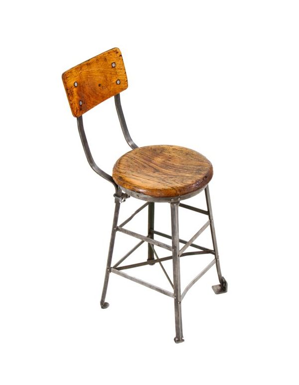 original sturdy c. 1920's heavily reinforced american industrial riveted joint brushed steel four-legged factory stool with oak wood stationary seat 