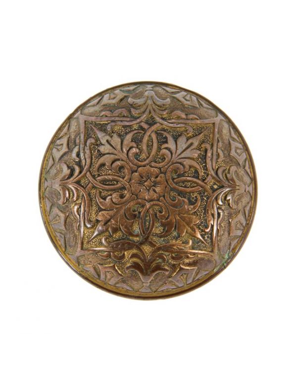 original and elegantly designed c. 1870's antique american ornamental cast bronze interior residential banded rim doorknob with largely intact aged patina 