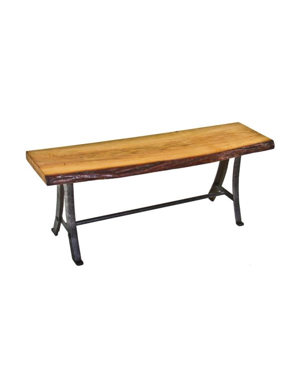 vintage american industrial low-lying stationary sitting bench comprised of old growth poplar wood and cast iron factory machine legs