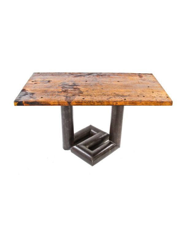 unusual repurposed industrial american steam boiler return pipe table base with weathered and worn solid maple wood top
