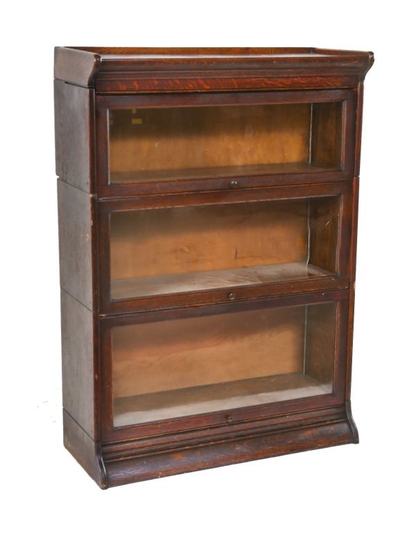 original early 20th century american factory office varnished oak wood three-unit stackable "barrister" bookcase with plate glass doors