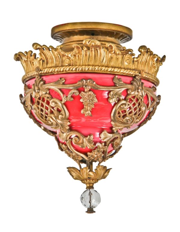 stunning all original and historically important ornamental gilded omolu cast bronze interior uptown theater single electric pendant light with richly colored cased glass shade 
