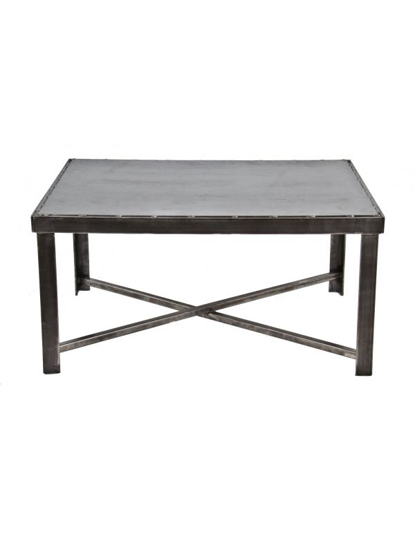 original and intact reconfigured c. 1940's vintage american industrial all-welded joint heavy gauge four-legged steel low-lying coffee table with a sealed bare metal finish 