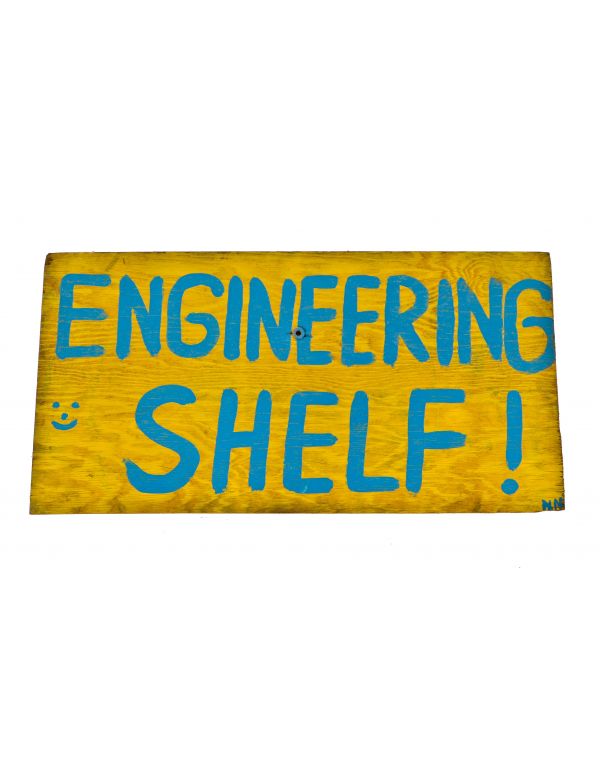 original and brightly colored hand-painted american industrial folk art single-sided "engineering shelf" wood sign with bold blue lettering against a yellow background