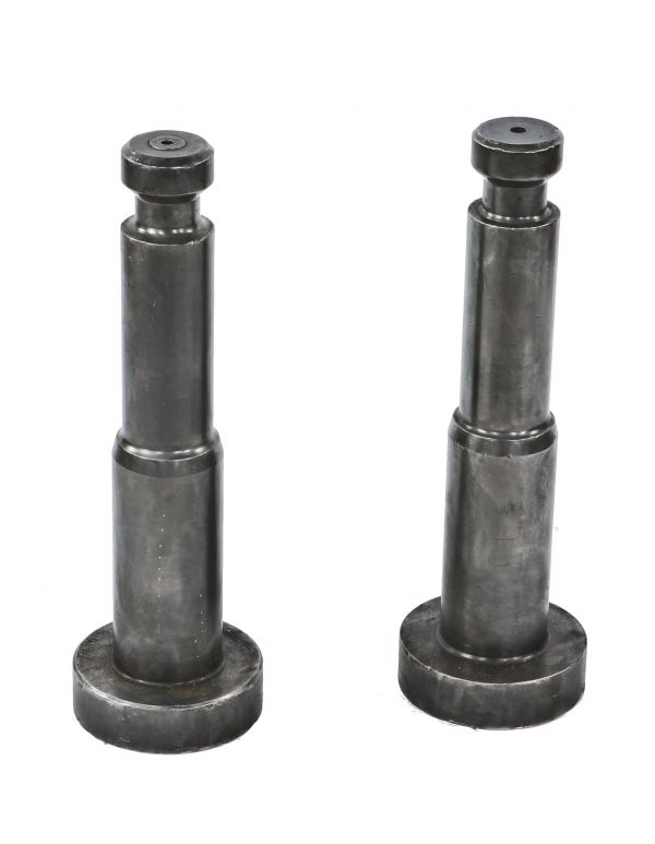 two original and remarkably heavy vintage american industrial refinished solid cast steel pedestal type machine components with applied clear coat finish 