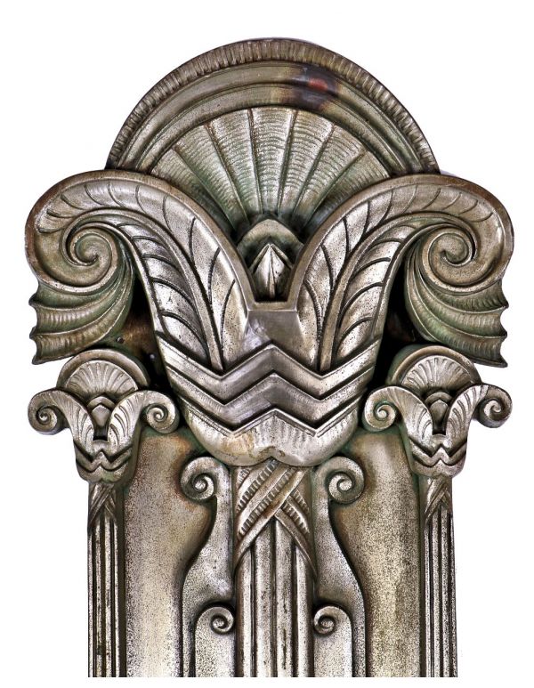 all original and historically important american c. 1929 american art deco style oversized nickel-plated cast bronze palmolive building facade pilaster with visually stunning endcap