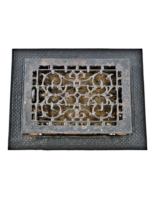 hard to find all original late 19th century black enameled ornamental cast iron salvaged chicago residential flush mount floor register with intact cast iron surround