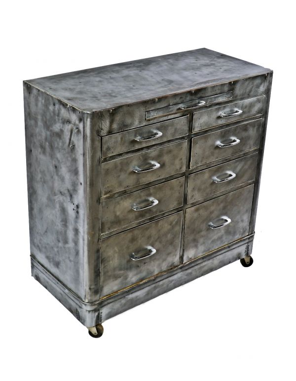 refinished c. 1940's american industrial brushed cold-rolled steel multi-drawer hospital room cabinet with fully functional bassick swivel casters 