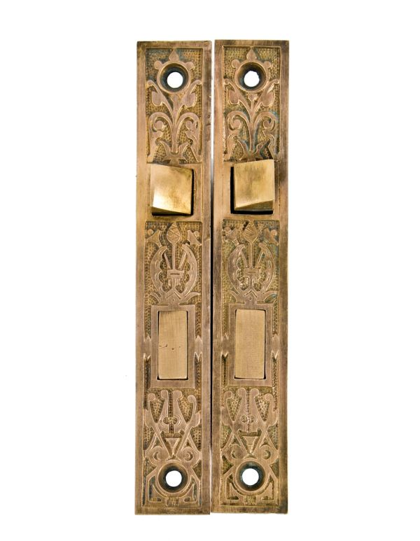 two matching all original c. 1880's antique american interior residential passage door mortise locks with ornamental brass face plates