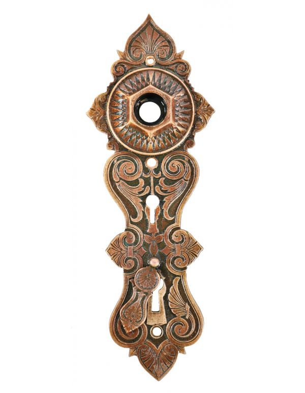 original early 1870's hard to find and highly desirable ornamental "real bronze" exterior entrance door escutcheon or backplate with intact swinging keyhole cover