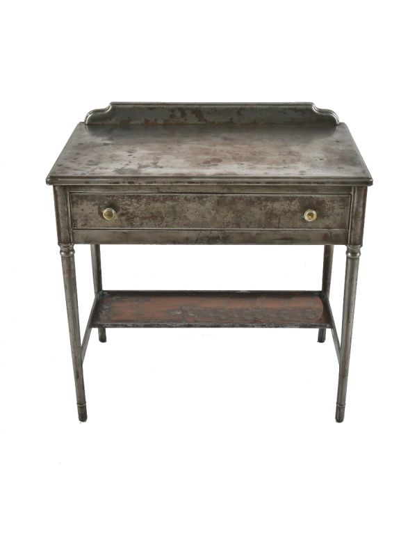 highly desirable original depression era simmons pressed and folded brushed metal four-legged desk with single oversized drawer and undershelf 