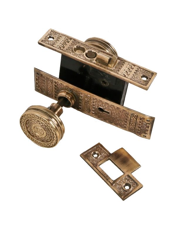 original late 19th century ornamental cast bronze "brocade" pattern exterior residential entrance door lockset with hard to find strike plate