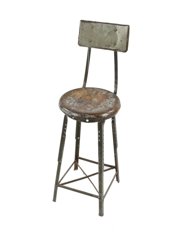 1930's antique american industrial riveted joint angled steel adjustable height factory stool or chair with oak seat and backrest 