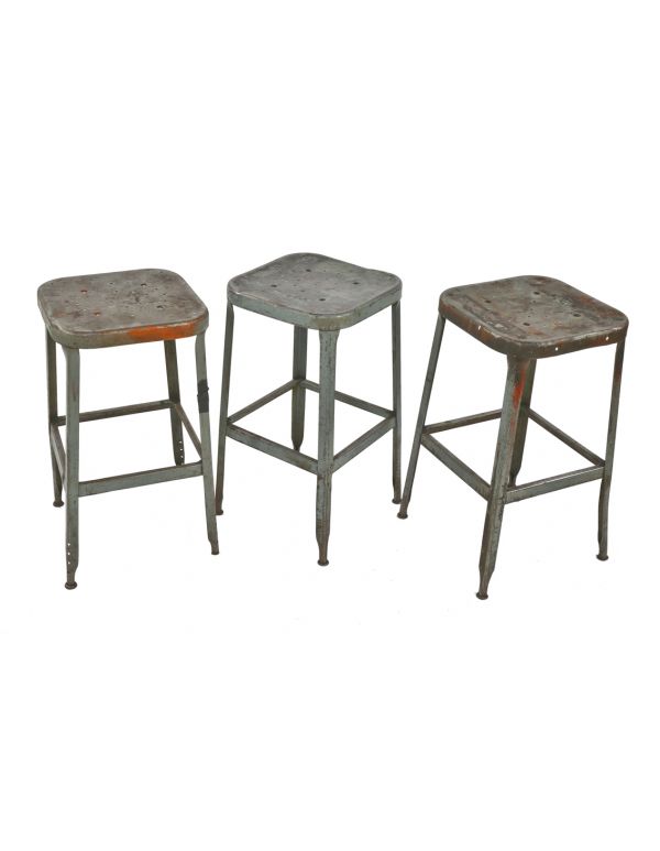group of matching c. 1950's reinforced gunship gray enameled salvaged chicago factory pressed and folded steel lyon stools with nicely aged patina 