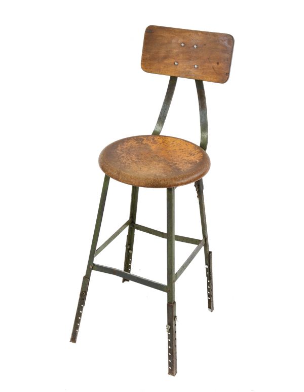 all original 1940's pollard brothers four-legged riveted and welded steel adjustable height factory stool with original olive green enameled finish 